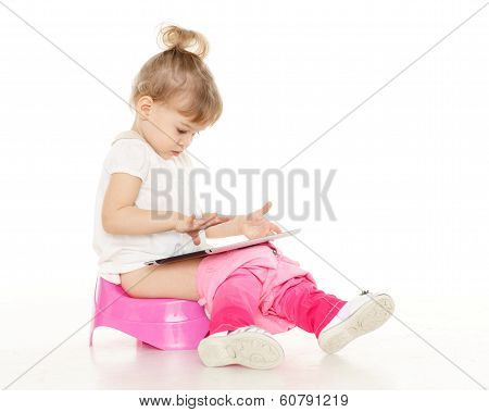 Pretty Little Girl Sits On Potty.