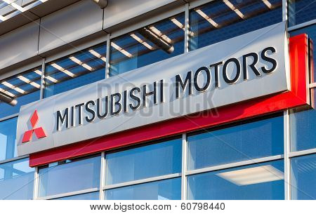 Samara, Russia - November 24, 2013: The Emblem Mitsubishi On The Office Of Official Dealer.  Mitsubi