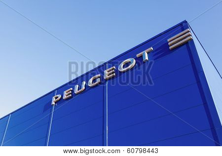 Samara, Russia - November 24, 2013: The Emblem Peugeot On The Building Of Official Dealer. Peugeot I