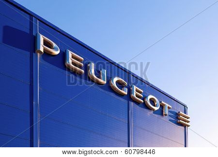 Samara, Russia - November 24, 2013: The Emblem Peugeot On The Building Of Official Dealer. Peugeot I