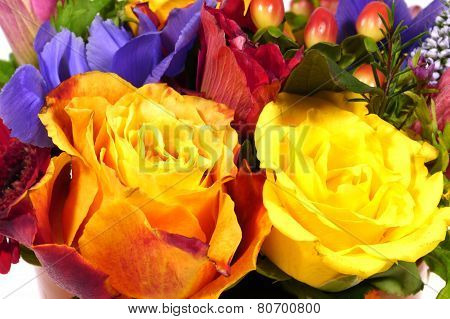 Yellow roses in an arrangement