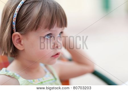 Cute Little Girl Waiting For Someone Or Something