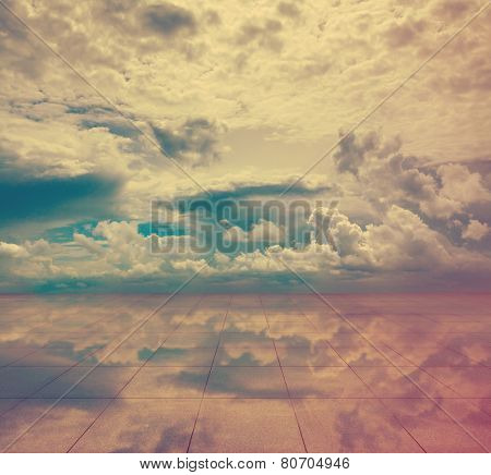 blue sky and miror floor, cloudy background, retro film filtered, instagram style 