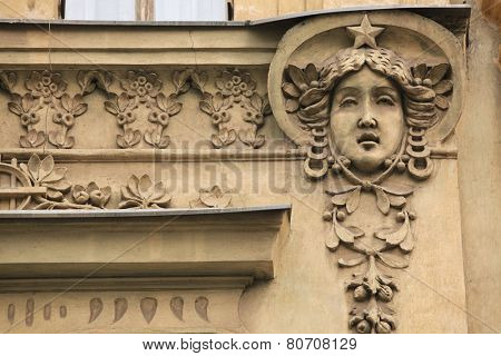 Mascaron on the Art Nouveau building in Prague, Czech Republic.