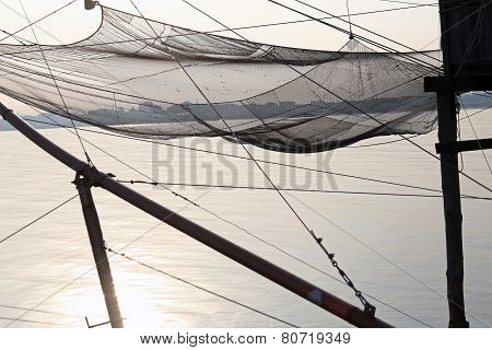 Fishing Nets Over The Stilt Houses Of Wood