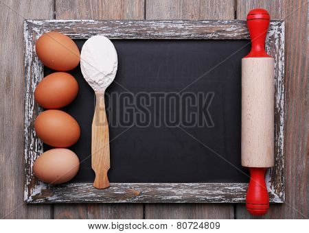 Blackboard menu blank on rustic wooden planks background
