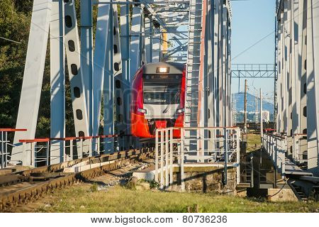 Train Passes On Bridge
