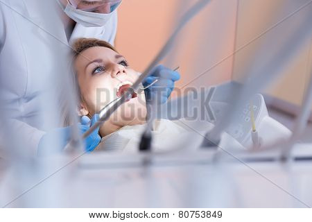 Dentistry Examining Patient's Teeth