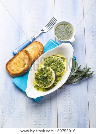 marinated tomino cheese with herbs