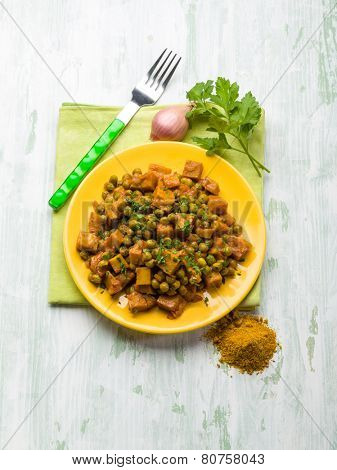 seitan stew with peas and curry, vegetarian food