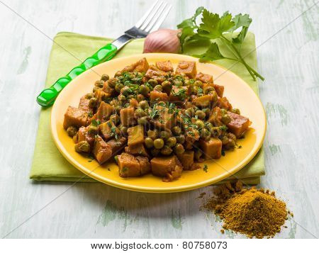 seitan stew with peas and curry, vegetarian food