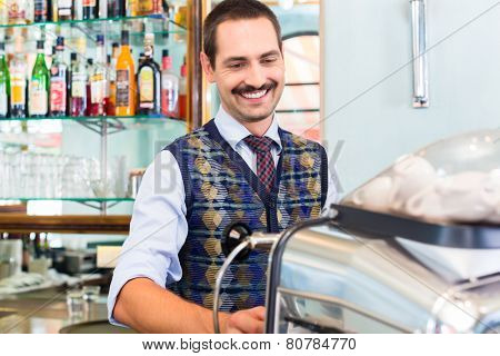 Barista preparing coffee in cafe bar using professional espresso machine