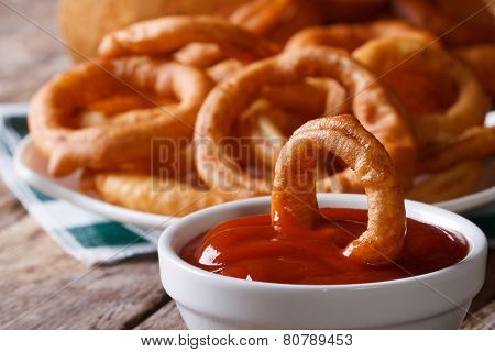 Deep-fried Onion Rings With Ketchup Macro. Horizontal