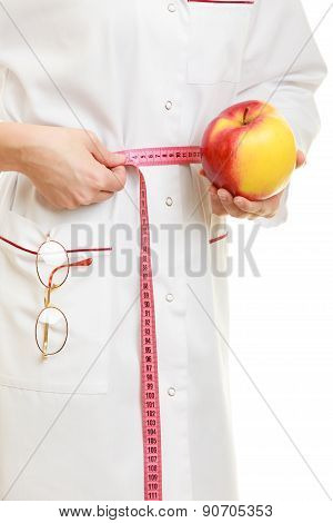 Doctor Specialist Holding Fruit Apple Measuring Waist