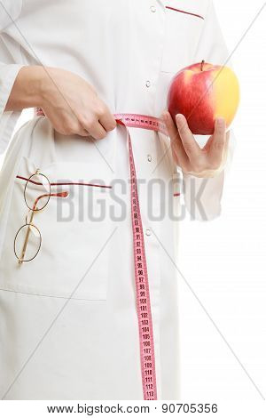 Doctor Specialist Holding Fruit Apple Measuring Waist