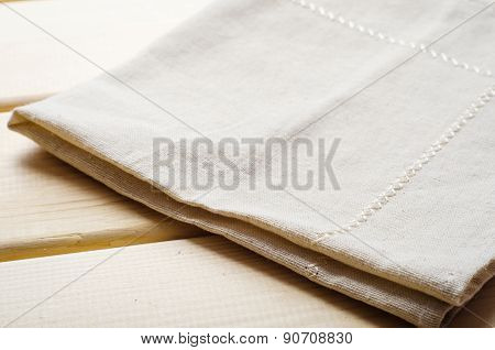 natural beige cotton cloth on wooden table