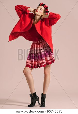 Fashion model pose on light background