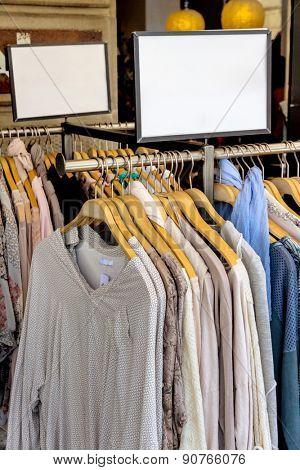 Clothing racks in a shop.