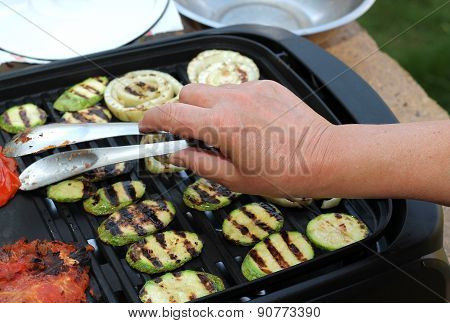Grilling Vegetables, Womens Hand