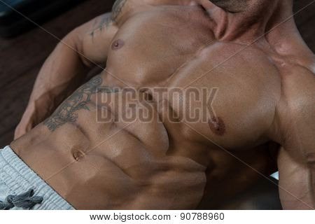 Mature Man Working Out With An Exercise Ball