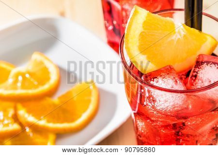 Top Of View Of Glass Of Spritz Aperitif Aperol Cocktail With Orange Slices And Ice Cubes