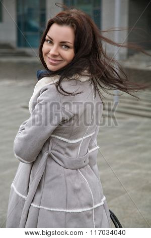 Girl With A Cheerfull Smile On The Street