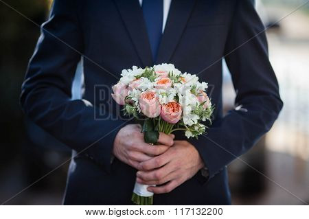 Stylish Elegant Bride Holds A Lush Bouquet Of Flowers