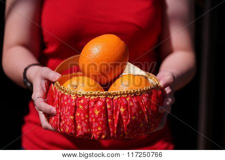 Girl With Orange Basket For Chinese New Year Gifts, Traditional Celebration, China, Happy Chinese Ne