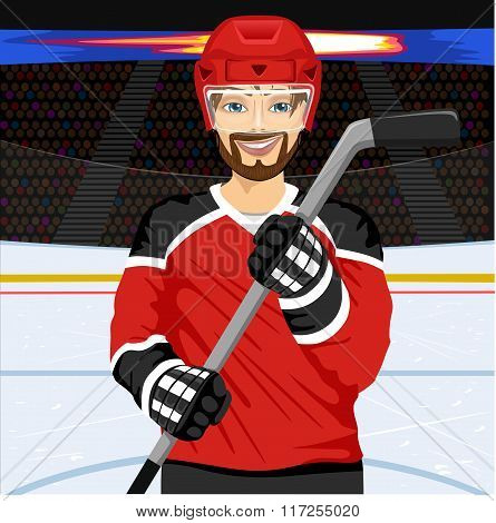 male ice hockey player with an ice hockey stick