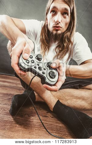 Male Player Focus On Play Games