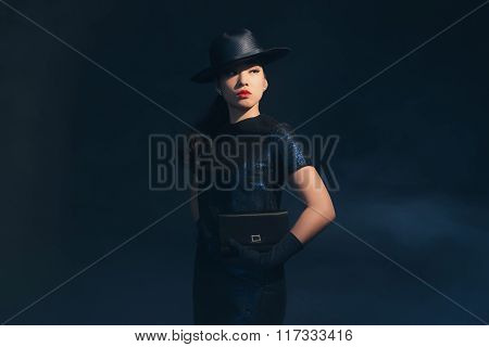 Stylish Retro 1940 Asian Fashion Woman. Holding Handbag. Wearing Hat.