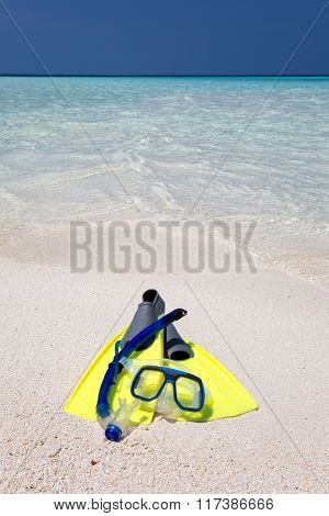 Snorkeling gear on a beach