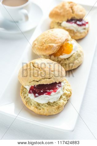 Scones With Cream And Fruit Jam
