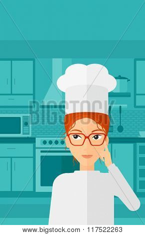 Chef pointing forefinger up.