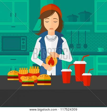 Woman suffering from heartburn.