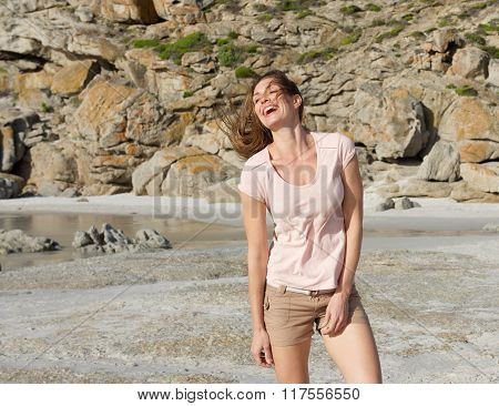 Female Fashion Model In Summer Clothes Laughing