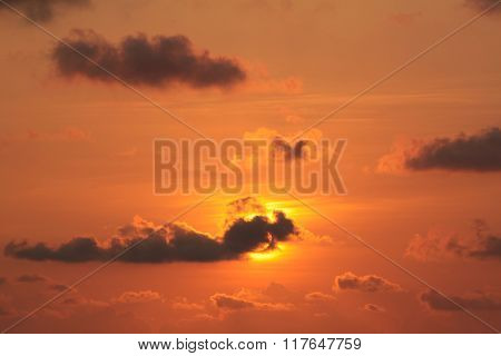 Sunset Behind The Clouds