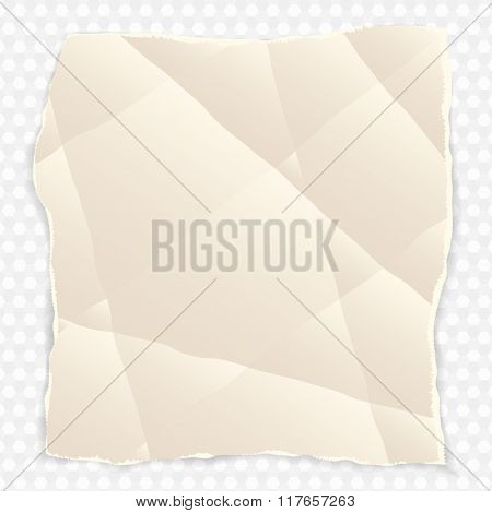 crumpled piece of paper with torn edges