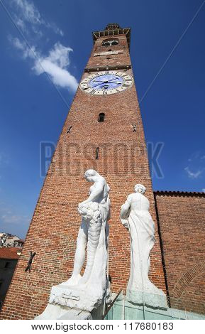 Ancient Clock Tower Of The Palladiana Basilica In Vicenza In Italy