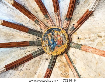 BARCELONA SPAIN - FEBRUARY 22 2015: Figures in the ceiling of Santa Maria del Mar gothic cathedral in Barcelona. The cathedral was built between 1329 and 1383.