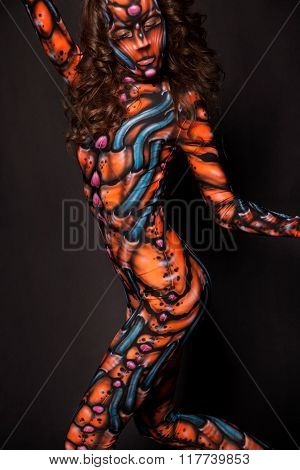 Freak girl in the aerography costume posing