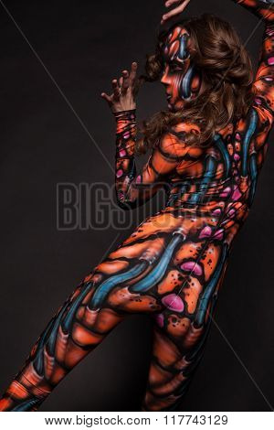 Freak girl in the aerography costume posing