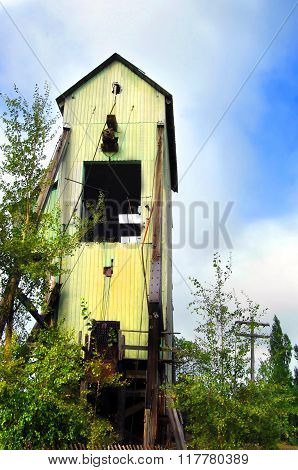 Overgrown shaft house is remaining relic of the Copper Mining industry in Upper Peninsula. This shaft house is near Calumet Michigan.
