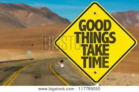 Good Things Take Time sign on desert road
