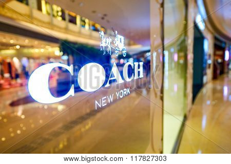 HONG KONG - JANUARY 27, 2016: Coach logo on the wall at Elements Shopping Mall. Coach, Inc. is an American luxury fashion company based in New York City