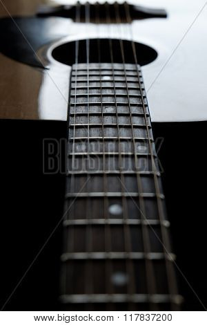 Closeup detail of guitar strings for playing music instrument talent strum strumming