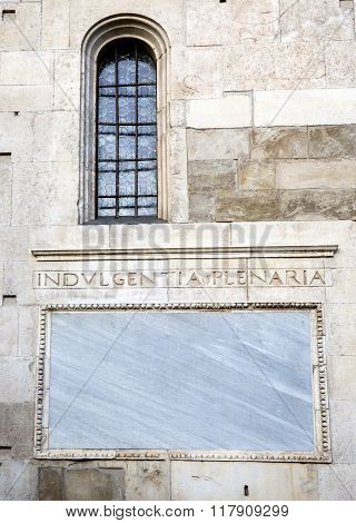 Words On Stone. Facade Of The Cathedral Of Modena. Italy