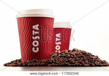 Composition With Cup Of Costa Coffee Coffee And Beans