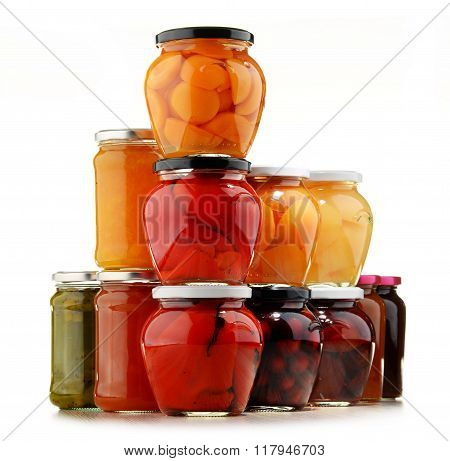 Jars With Fruity Compotes And Jams. Preserved Fruits