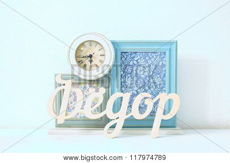 Fedor name on the background of picture frames and old clock art design